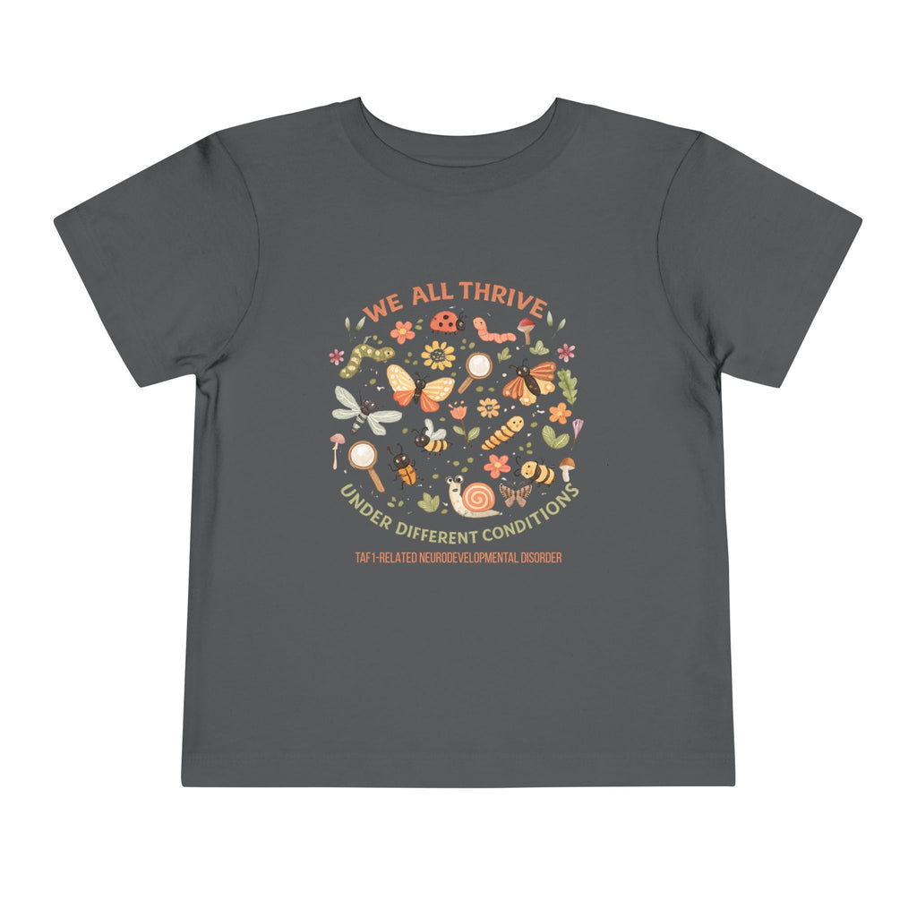 Toddler Tee — "We All Thrive" TAF-1 Neurodevelopmental Disorder Awareness Shirt