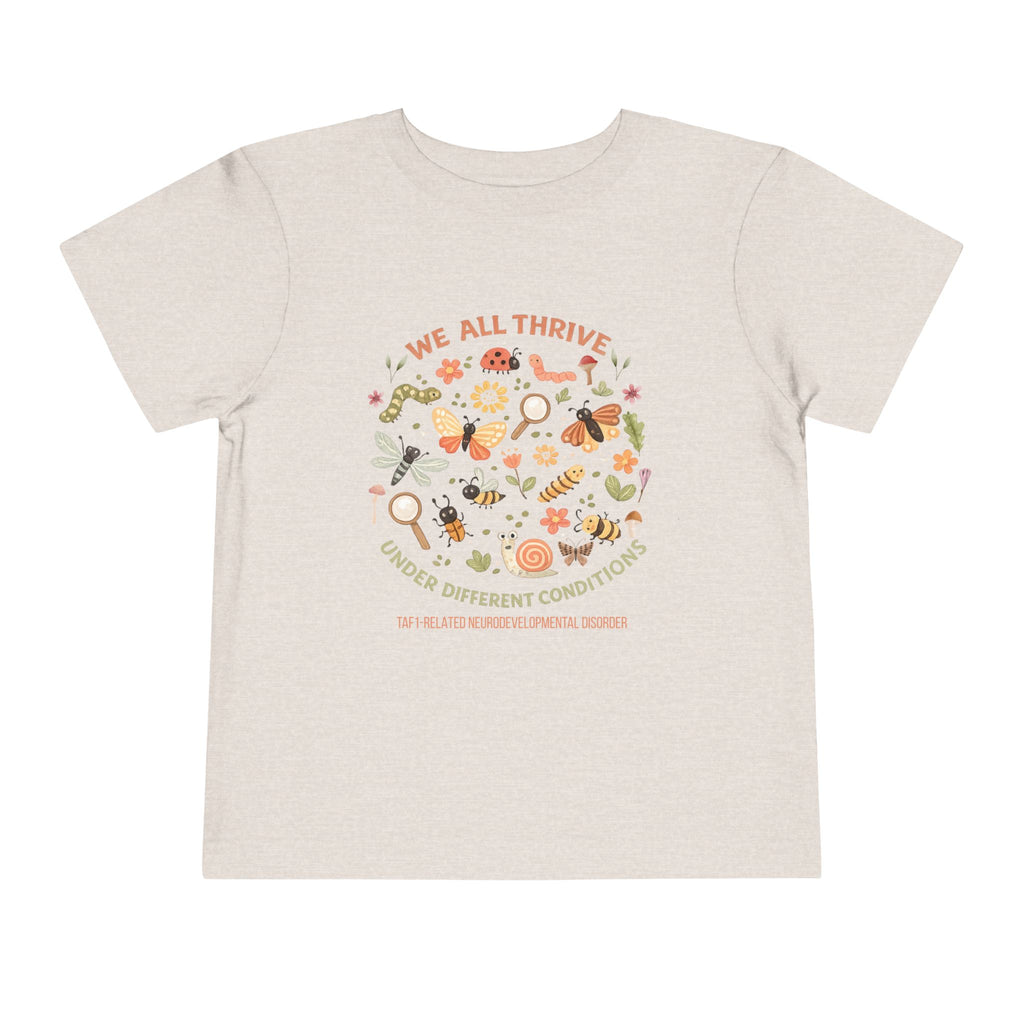 Toddler Tee — "We All Thrive" TAF-1 Neurodevelopmental Disorder Awareness Shirt