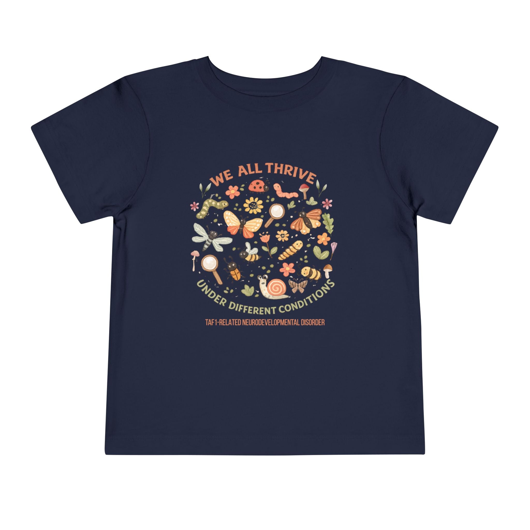 Toddler Tee — "We All Thrive" TAF-1 Neurodevelopmental Disorder Awareness Shirt
