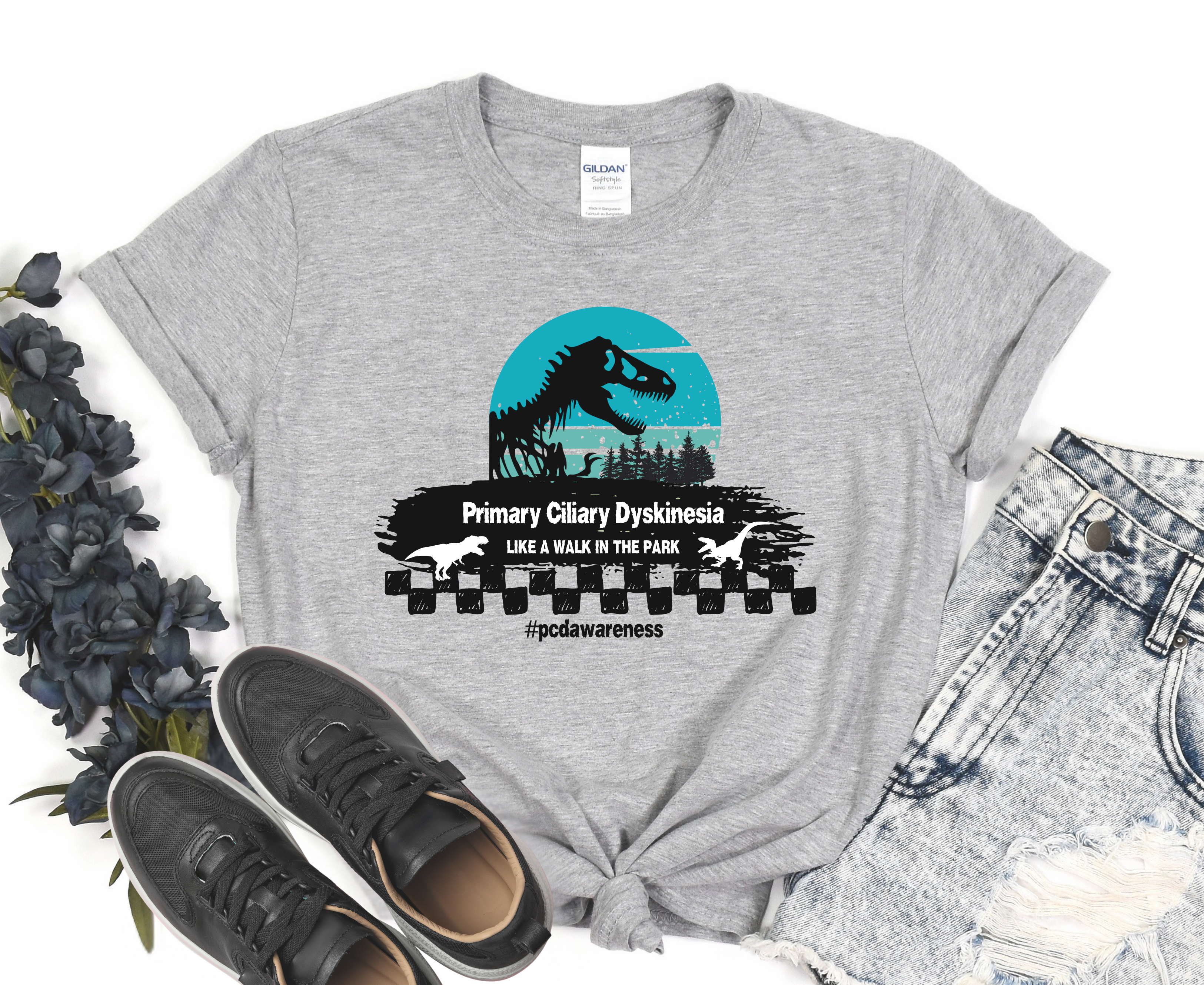 Unisex T-Shirt Primary Ciliary Dyskinesia Jurassic Park Design