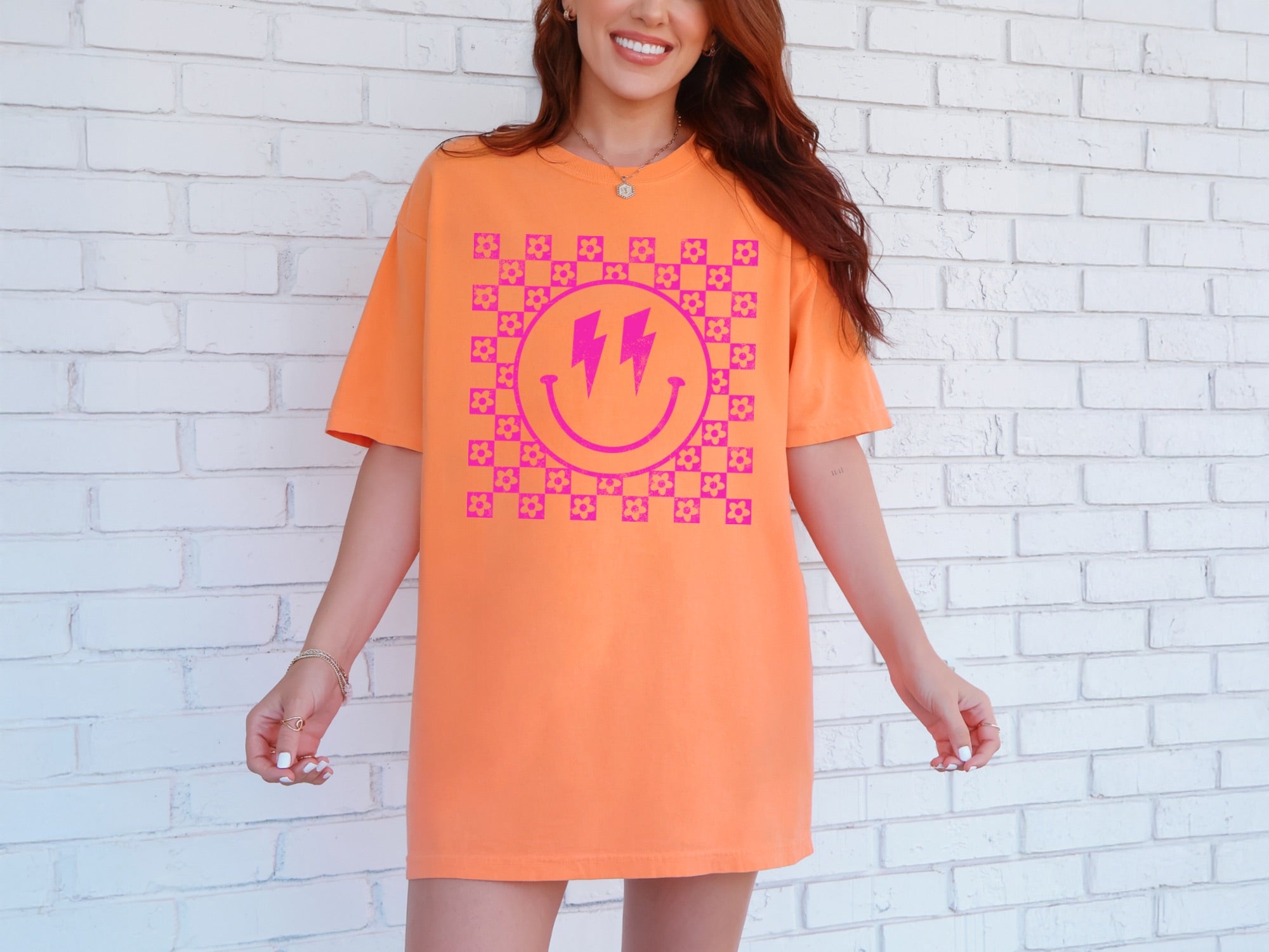 Pink Lightning Smile Tee - Retro Checkerboard Graphic T-Shirt