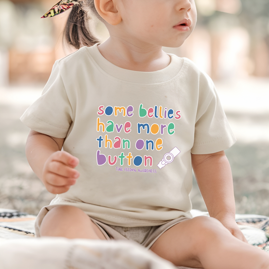 Tube Feeding Awareness Toddler Tee — "Some Bellies Have More Than One Button"